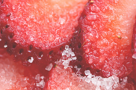 切贝利新鲜的维他命贝利背景 切草莓糖填充背景 红色健康美味草莓加糖背景