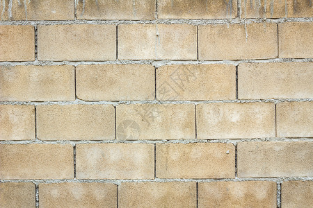 煤渣空心砖墙建筑工人水泥材料工作石工灰色石头房子工业背景