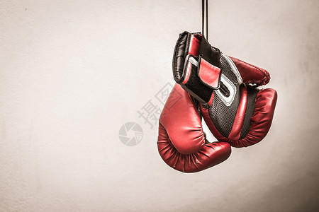 相对拳击手套照片红色动机斗争力量运动背景图片