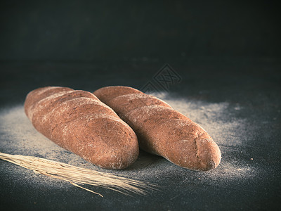 黑麦面粉两全自制黑麦面包面包 复制空间面包早餐食物面团烤箱高架棕色黑色拓荒者面粉背景