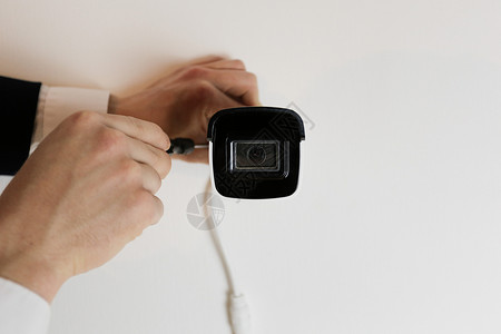 每日c安装闭路电视摄像头 以保障家庭安全记录技术间谍监视器技术员检测安全系统程序服务镜片背景