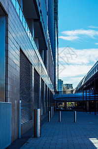 现代商业摩天大楼 高玻璃建筑 现代拱门蓝色公司财产总部反射城市景观工作库存高楼背景图片