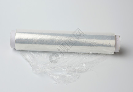 光滑卷轴用于包装食品的白色透明薄膜BEF材料管子包装厨房海浪线圈聚合物工作室床单环境背景