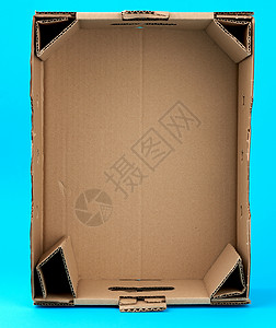 长方形纸盒蓝色背木上棕色纸的长方形空纸板盒羊皮纸贮存空白回收包装褐色办公室瓦楞盒子仓库背景