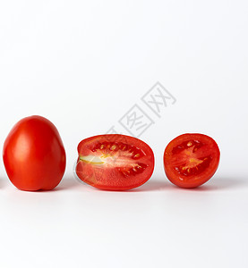 成熟的全红西红番茄和白底粉片 秋天背景图片