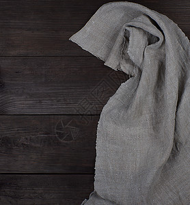 褐木木背景的灰色纸巾纸织物材料空间质感桌子棕色厨房木头乡村亚麻背景图片