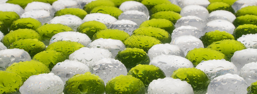 圆形塑料鹅卵石石头背景玻璃团体岩石碎石绿色白色模仿材料背景图片