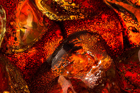 软饮料玻璃宏观液体起泡可乐汽水气泡古柯背景图片