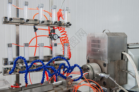 侧柱制造塑料剖面材料作坊工业制造业生产氯化物技术控制板平带机器工作背景
