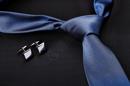 系带和袖扣蓝色的袖扣高清图片