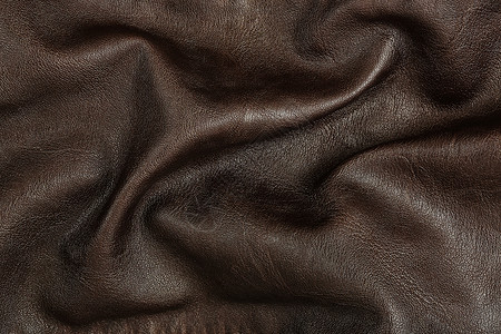 棕色皮革外貌衣服奢华优雅服饰衣柜购物波浪状高清图片