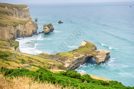 孔戈尼新西兰地道海滩海景全景悬崖旅游半岛海岸游客砂岩戏剧性地平线背景