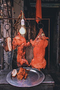 广东口味猪肉饮食街景美食家文化乳猪烘烤美食摄影旅游背景图片