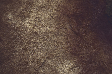 古老的深色铜花岗岩洞穴表面 用于室内背景图片