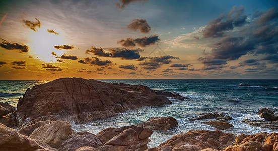 海上冲浪天际海滩地平线天空日落反射晴天阳光海岸线海岸背景图片