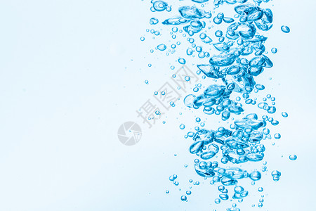 蓝色水底泡泡宏观水滴海浪白色液体流动气泡波纹背景图片
