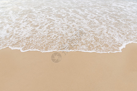 向沙滩挥起波浪海洋海浪阳光泡沫热带液体游泳蓝色海岸天蓝色背景图片