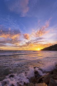 日落天空和热带海阳光反射晴天地平线日光天气天蓝色海岸线海滩橙子背景图片