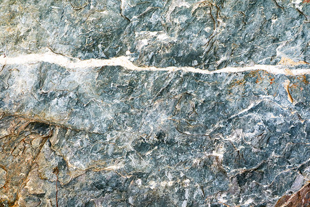抽象的古代花岗岩大理石板材表面洞穴内部床单地面火花花纹墙纸火山蓝色石头侵蚀矿物背景图片