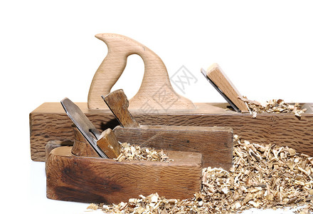 古董木制品工具手工雕刻木头木工白色飞机刨床作坊工艺背景图片