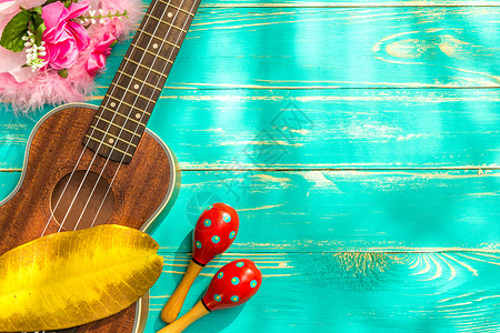 夏威夷小吉他Ukulele  Ukulele 背景夏威夷的 Ukulele 音乐教学乐器细绳吉他旅行假期蓝色背景
