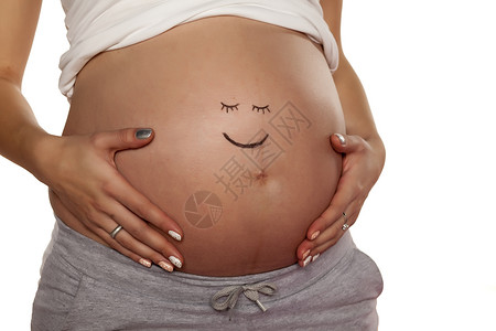 手画笑脸孕妇在肚子上装着笑容的笑脸婴儿女士白色身体女性母性女孩幸福母亲孩子背景
