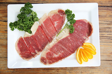 牛肉切片后盾用餐牛扒动物节日午餐蔬菜烹饪香料食物背景