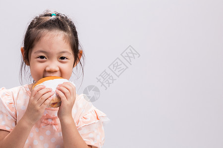 儿童吃汉堡包/儿童吃汉堡的背书背景图片