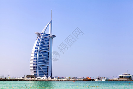迪拜玻璃景点酒店旅行天空蓝色摩天大楼旅游假期建筑背景图片
