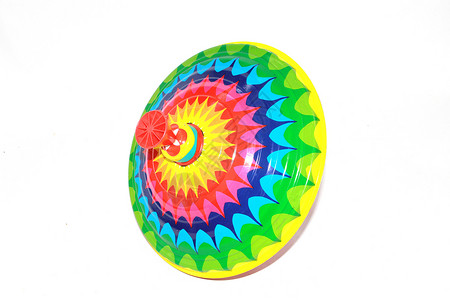 彩色陀螺20世纪70年代儿童在彩虹彩色中的旋转顶峰乐趣孩子玩具运动闲暇漩涡陀螺圆圈幼儿园白色背景