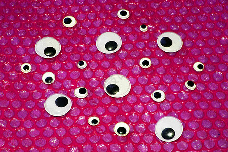 滑稽的谷歌笑笑地毯背景乐趣毛皮粉色黑色惊奇爱好玩具红色卡通片眼球背景图片