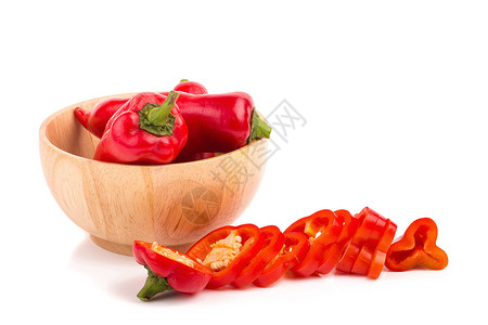 蔬菜字母在Wooden碗中的红辣椒蔬菜白本孤立植物辣椒香料宏观团体胡椒香肠烹饪食物背景
