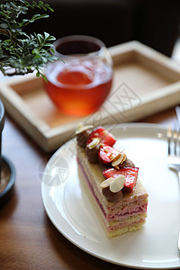 甜甜奶酪蛋糕草莓蛋糕甜甜甜甜食和草莓坚果饼美食桌子蛋糕坚果庆典叶子香草甜点面包食物背景