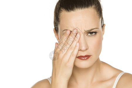 妇女眼痛压力疼痛过敏女性眼睛背景图片