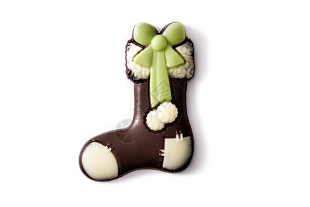 圣诞袜子季节性绿色食物庆典棕色糕点糖果甜点巧克力短袜背景图片