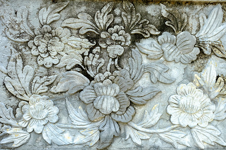 石墙上的复古泰国雕塑艺术雕刻水泥装饰建筑学文化灰色白色石头风格背景图片