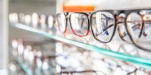 展示眼镜带有二分立镜的玻璃显示器插件 复制空间配镜师眼睛商业框架光学店铺验光眼科阴影镜片背景