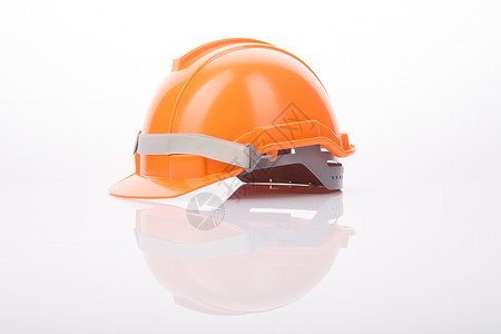 橙色安全头盔硬帽背景图片