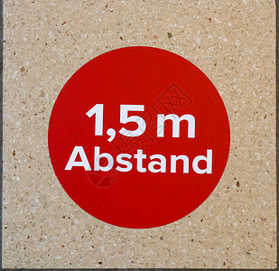 保持1米社交距离保持德国语言的距离符号  1注意力民众红色感染图表地面安全隔离横幅社会背景