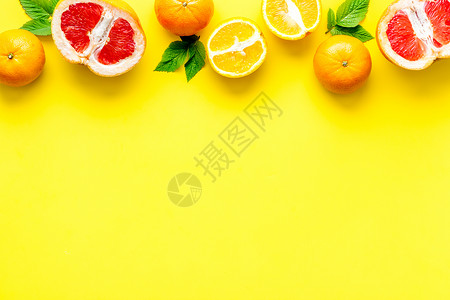 黄色背景顶视图的柑橘水果收藏绿色热带橙子顶框红色柚子柠檬团体叶子背景图片