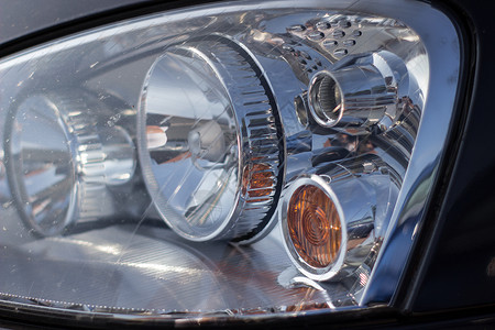 信号格汽车的右前大灯 头灯摩托车备件玻璃运输物品机械运动驾驶保险杠商业背景