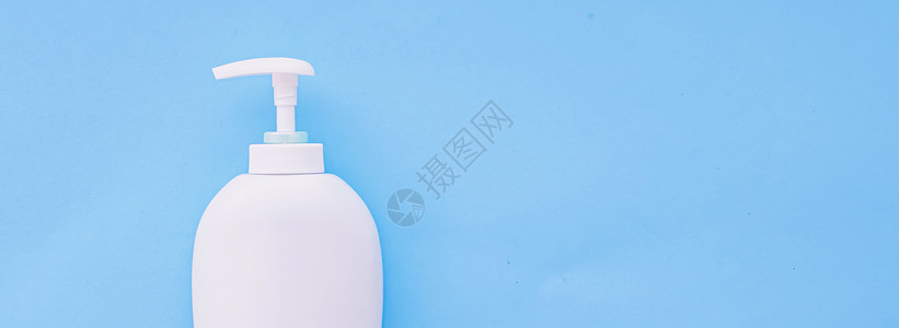 面料小样白标签化妆品容器瓶 作为蓝底产品模拟的蓝色面料管子肥皂身体小样卫生洗发水护理浴室包装凝胶背景