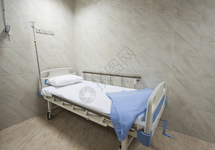 在医院病房的床铺家具毯子桌子手术医疗保险地面医疗室外科枕头风格背景图片
