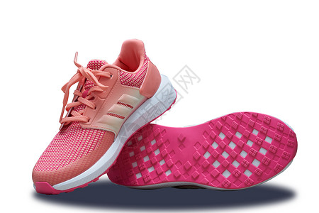 在白色孤立的后院带单底鞋的粉红运动鞋跑步黑色训练活动女性运动健身房女孩健康工作室背景图片