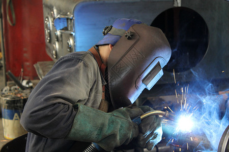 焊接器金属合金预热动作工作制成品建造焊机工具手套背景图片