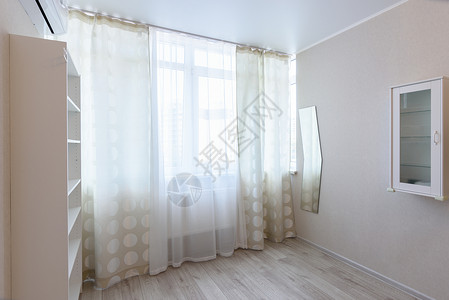 一座多层大楼内一间公寓房室内的盲人窗户 门窗背景图片