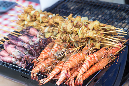 街头食品     烤制海鲜的边景背景图片