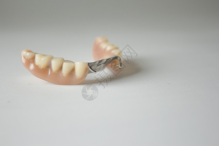 演播室拍摄假假牙假牙人类医学白色保健牙齿牙科金属健康医疗牙龈背景图片