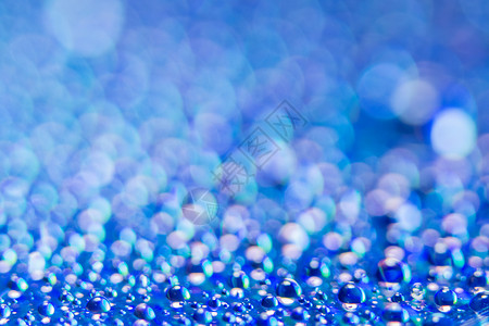 Bokeh背景蓝水滴织物背景图片