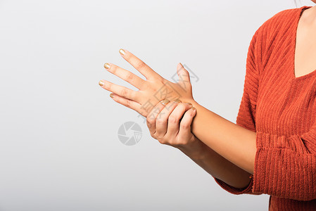 手指麻木她握着手腕的 女人卫生女士骨科治疗肌肉风湿疼痛腕骨保健隧道背景